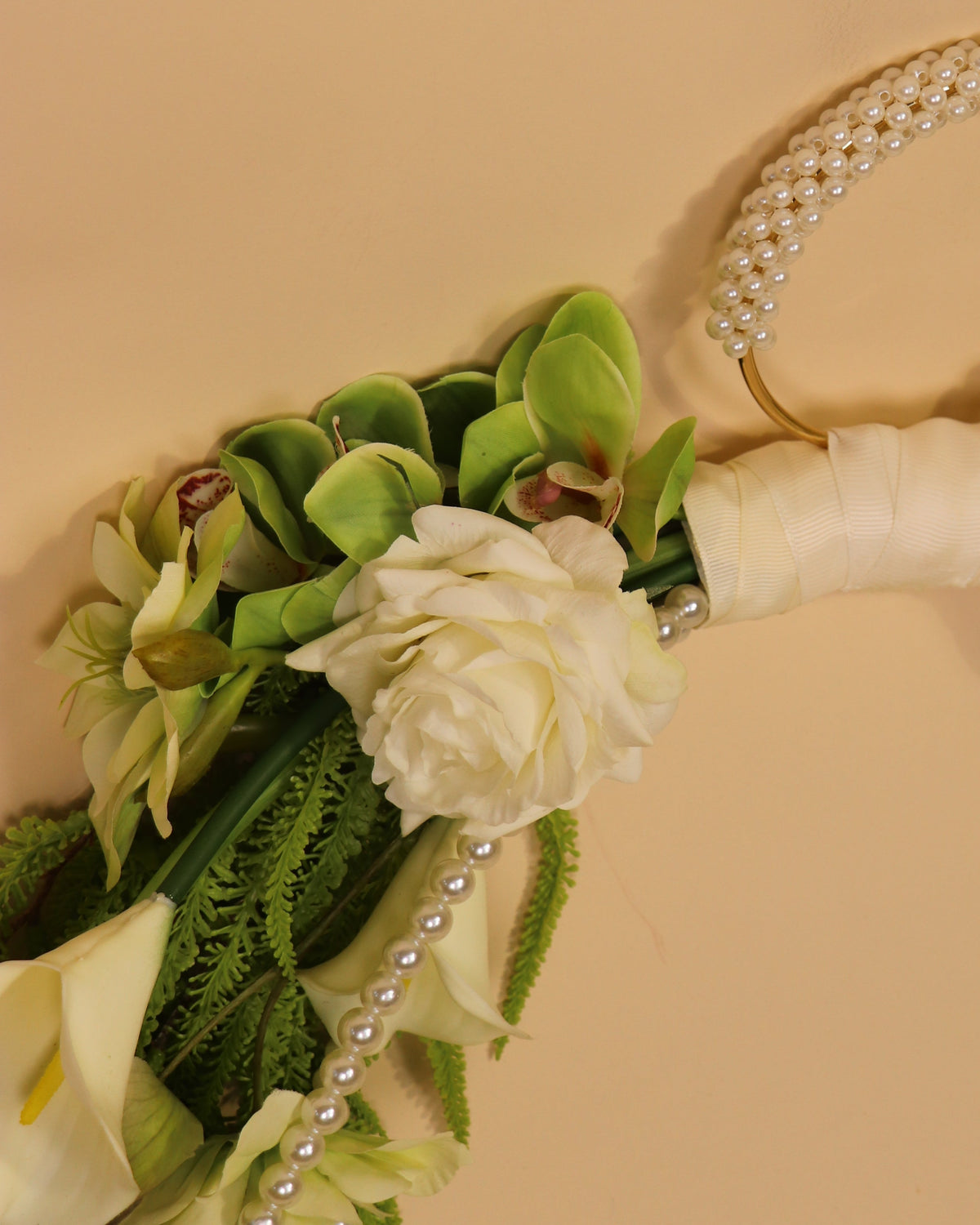 Close-up shot of the Greenstone Forest handbag bridal bouquet