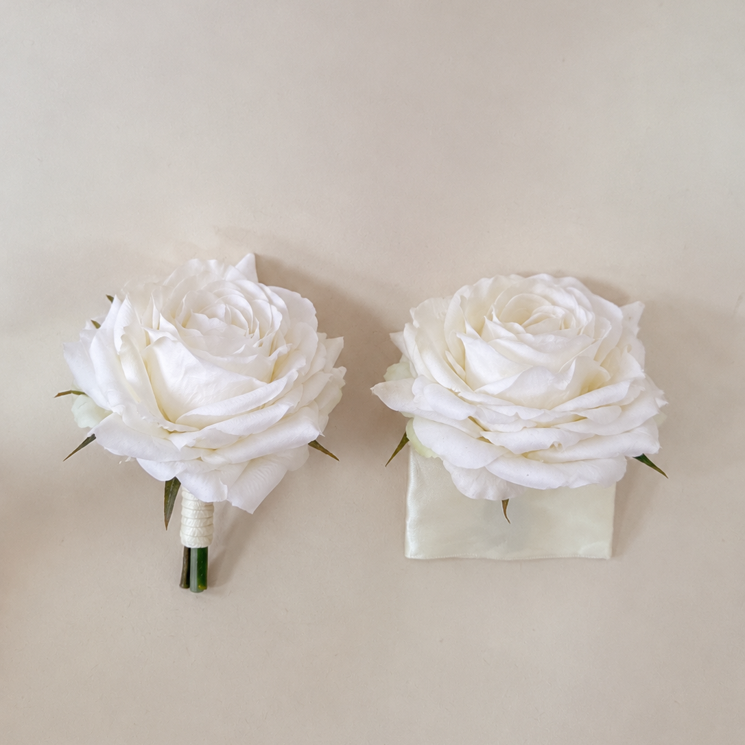 White rose buttonhole and pocket flower