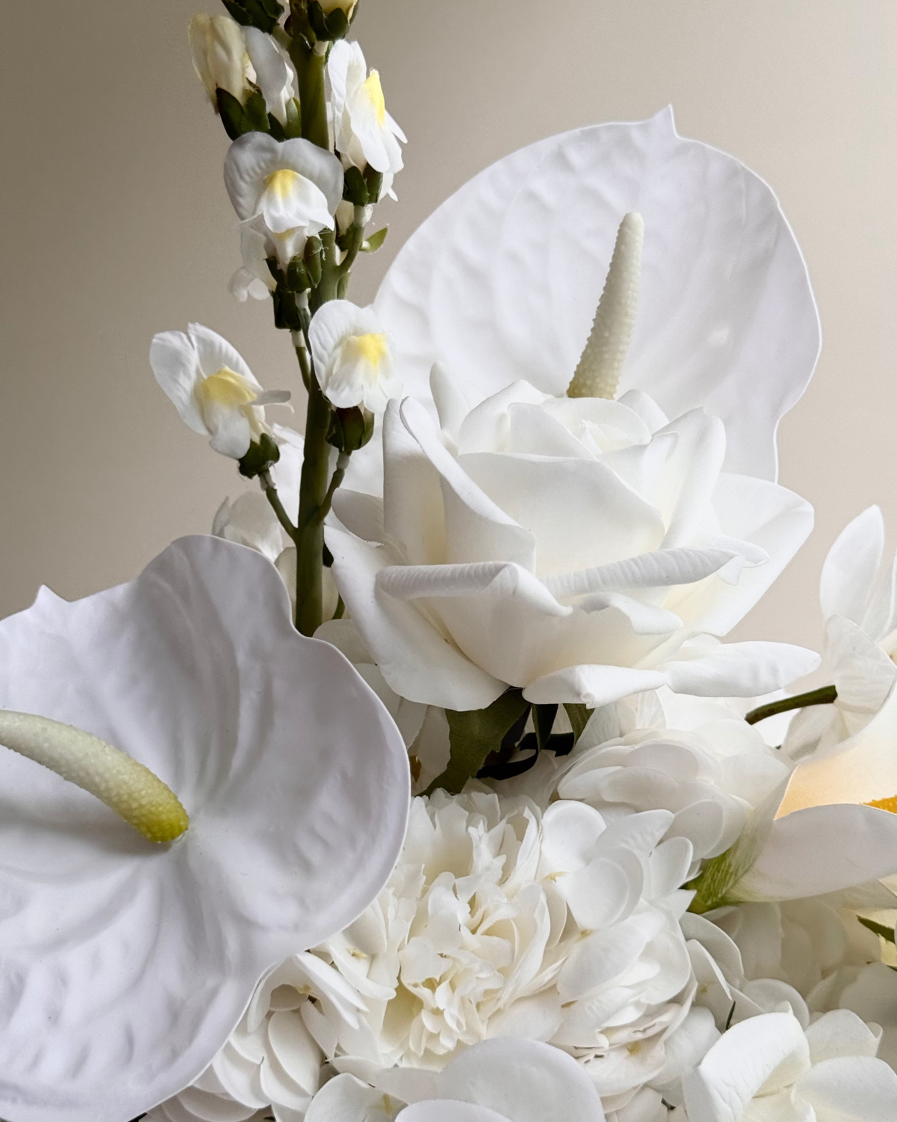White wedding bouquet with orchid roses calla lilly modern artificial bridal bouquet close up