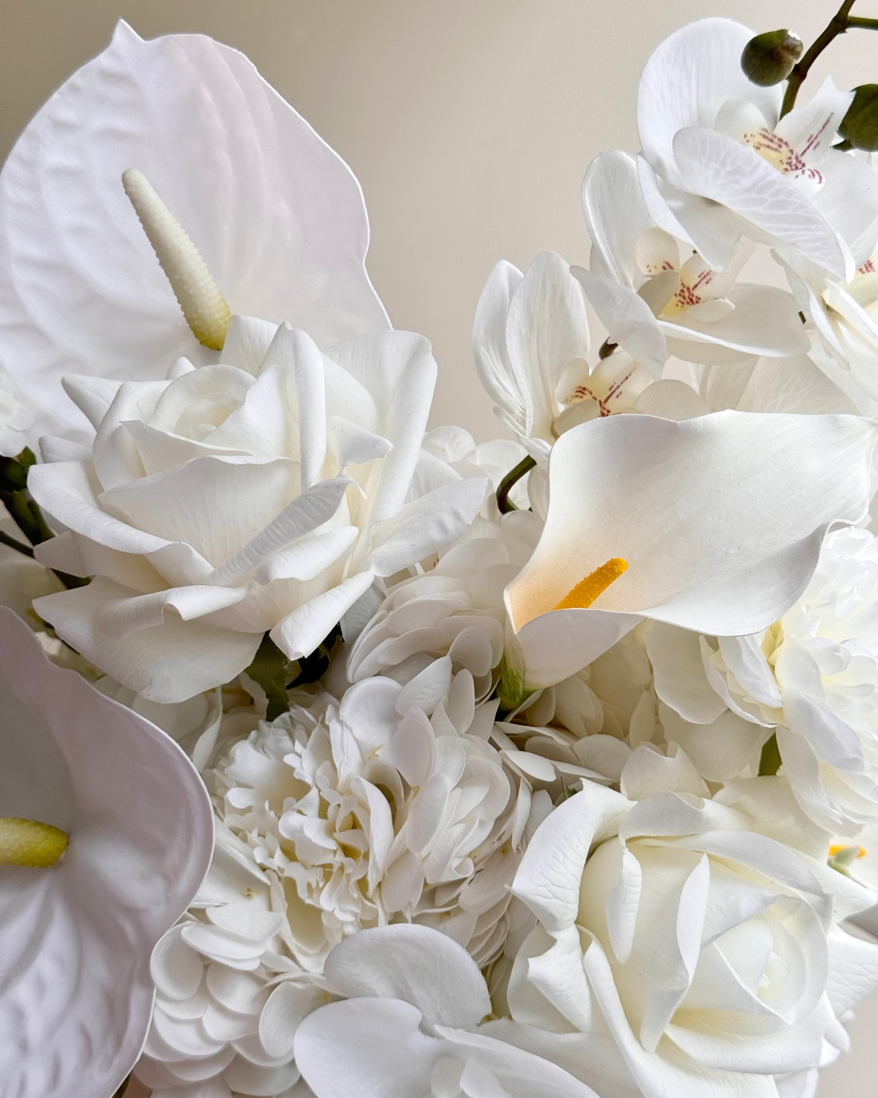 White wedding bouquet with orchid roses calla lilly modern artificial bridal bouquet close up