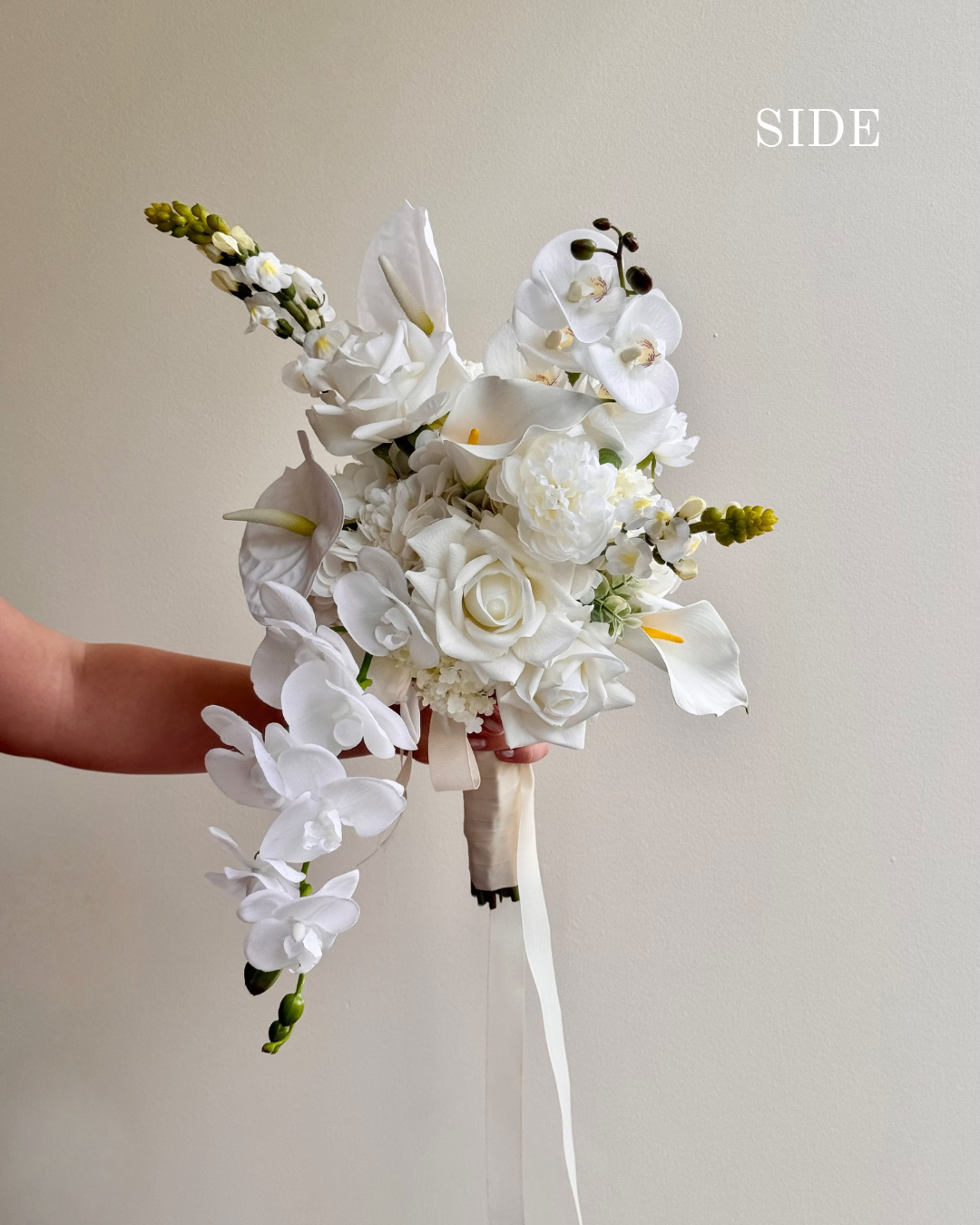 White wedding bouquet with orchid roses calla lilly modern artificial bridal bouquet from side