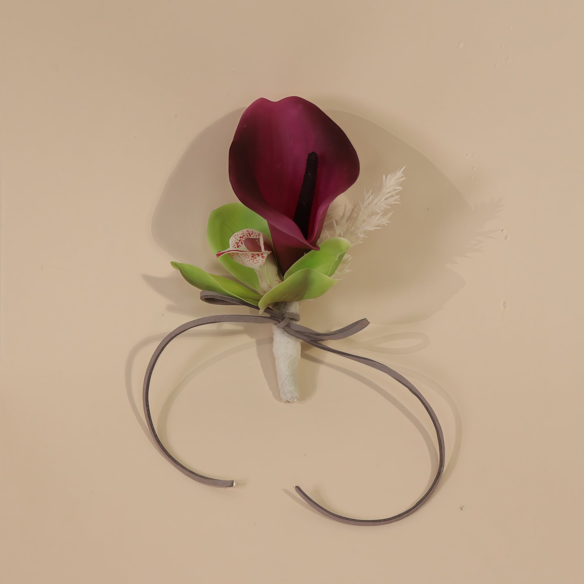 Burgundy Desire - Buttonhole (calla lily + cymbidium orchid)