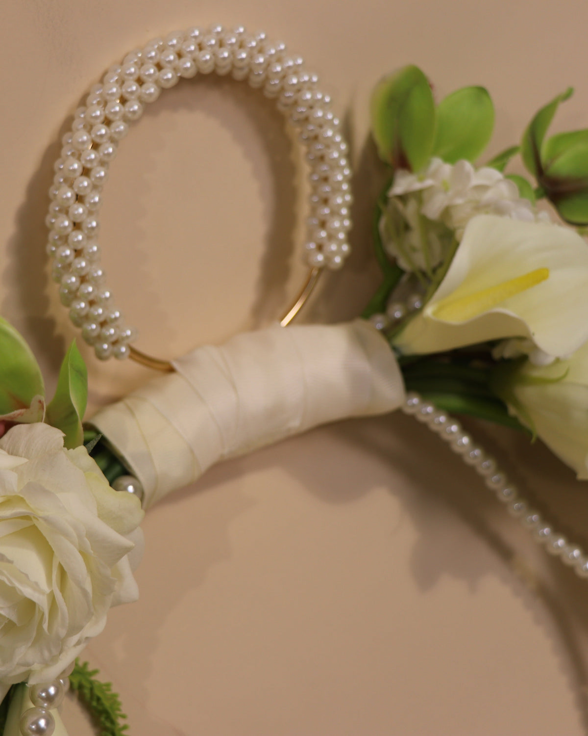 Close-up of the Greenstone Forest handbag bridal bouquet