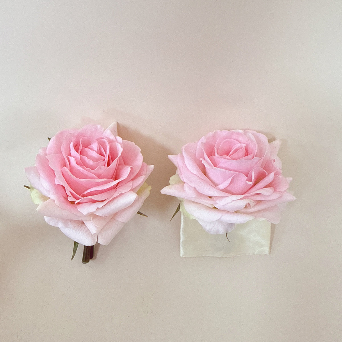 Pink rose buttonhole and pocket flower